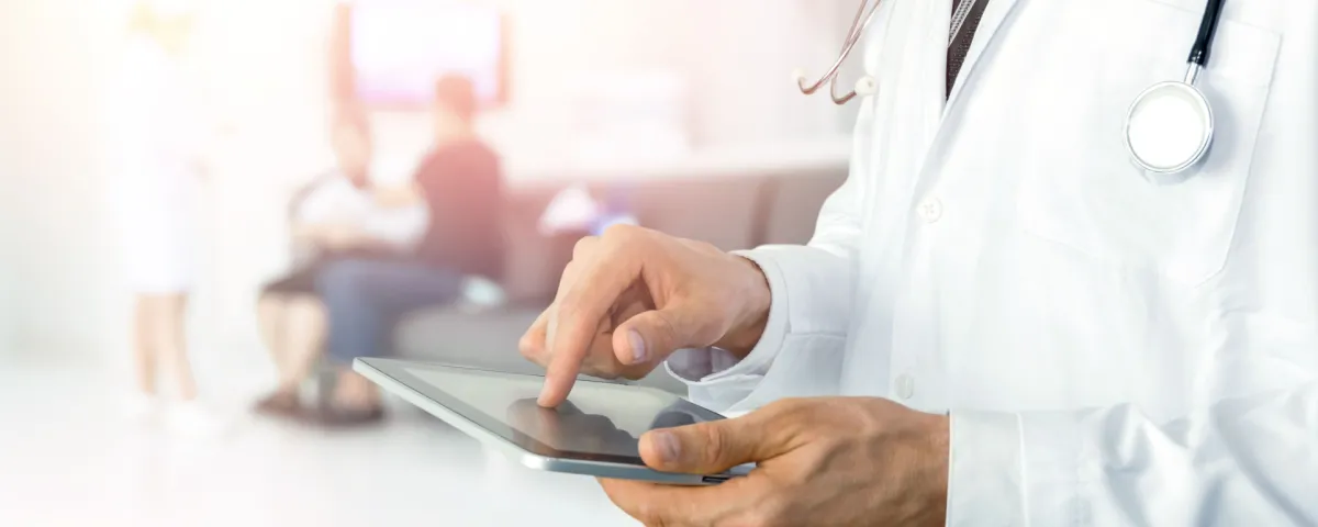 doctor using tablet for healthcare automation