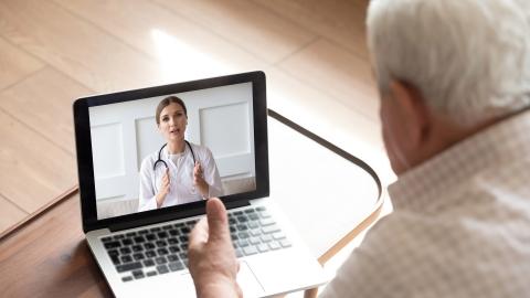 man and doctor on telehealth session