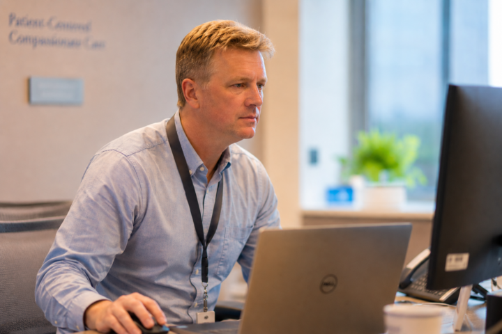 IT director working at a computer in an office