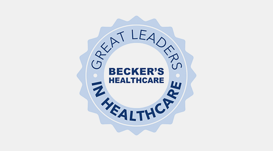 a light blue badge with the words "Great Leaders in Healthcare" around the words "Becker's Healthcare"